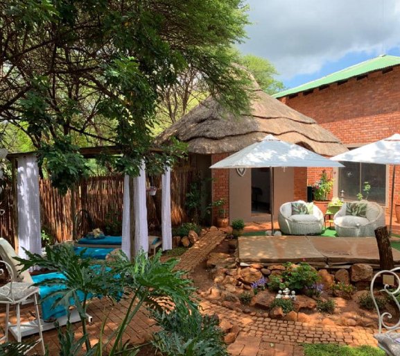 Tranquil outdoor spa area at Mbizi